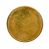 Single used blank brass coin, top view isolated on white