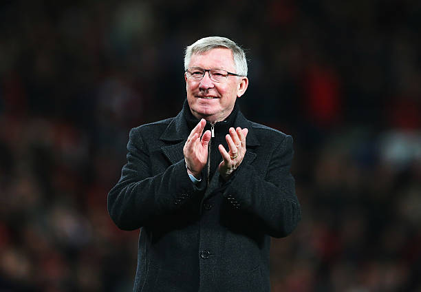 Sir Alex Ferguson manager of Manchester United celebrates victory and winning the Premier League title after the Barclays Premier League match...