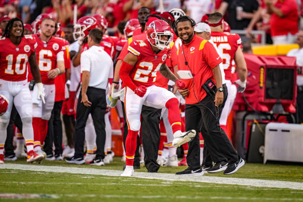 Skyy Moore of the Kansas City Chiefs celebrates along the sideline after a long punt return during the first quarter of the preseason game against...