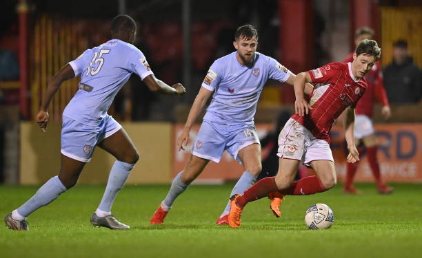 Sligo , Ireland - 24 October 2022; Will Fitzgerald of Sligo Rovers in action against Will Patching and Sadou Diallo, left, of Derry City during the...