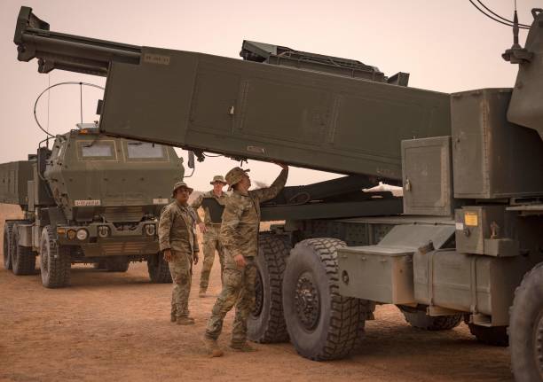 Soldier inspects an M142 High Mobility Artillery Rocket System launcher vehicle, during the African Lion military exercise in the Grier Labouihi...