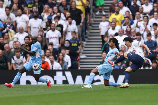 Son Heung-Min of Tottenham Hotspur scores his team's first goal during the Premier League match between Tottenham Hotspur and Manchester City at...