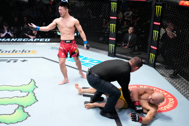 Song Yadong of China reacts after his knockout victory over Marlon Moraes of Brazil in their bantamweight fight during the UFC Fight Night event at...