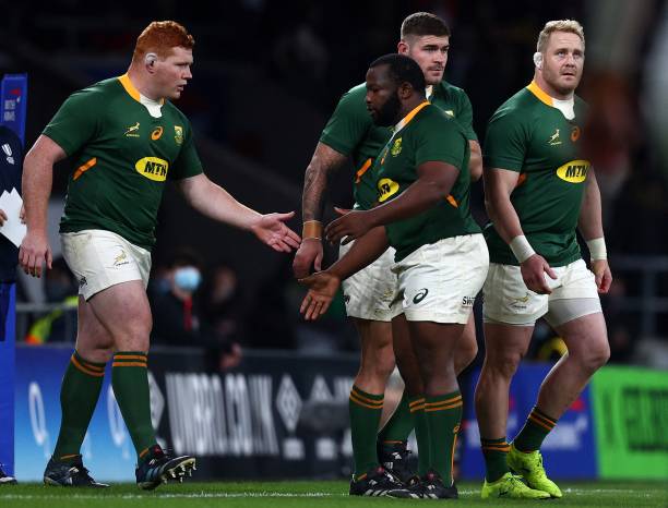 South Africa's Steven Kitshoff (L) taps hands with South Africa's prop Trevor Nyakane (2L) as he is substituted on with South Africa's Vincent Koch (R) during the Autumn International friendly rugby union match between England and South Africa at Twickenham Stadium, south-west London, on November 20, 2021. (Photo by Adrian DENNIS / AFP) (Photo by ADRIAN DENNIS/AFP via Getty Images)