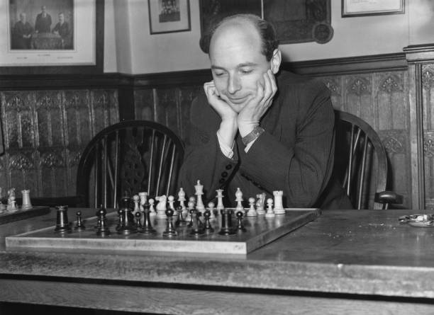 Soviet chess champion David Bronstein (1924 - 2006) takes part in the International Chess Congress at the White Rock Pavilion, Hastings, UK, 30th December 1953.