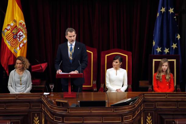 Spain's King Felipe VI delivers a speech next to speaker of the Spanish lower house of parliament Meritxell Batet Queen Letizia and Princess Leonor...