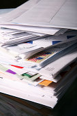 Stack of Junk Mail and Unpaid Bills