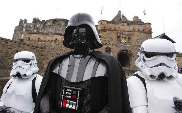 Star Wars character Darth Vader with Stormtroopers at Edinburgh Castle ahead of a screening of Star Wars Episode V The Empire Strikes Back at the...