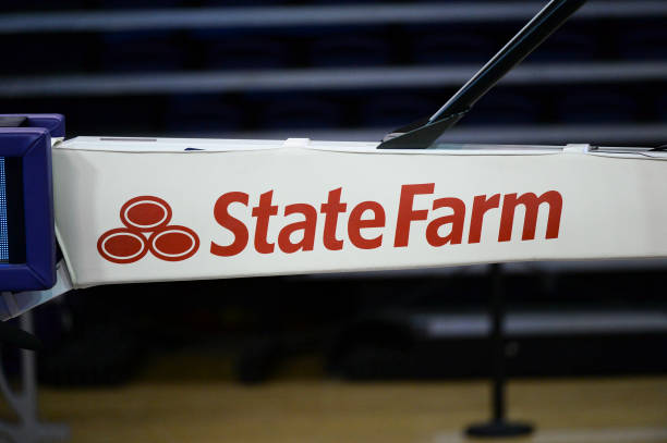 state farm ad is seen on the basket during a pac12 womens basketball picture