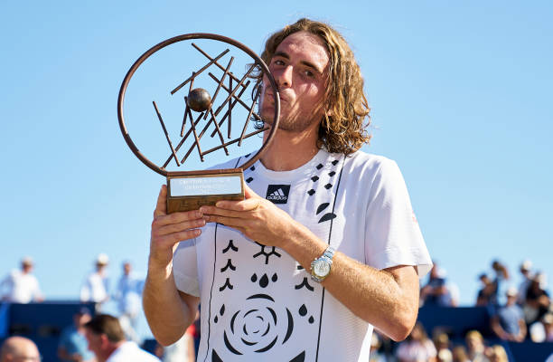 Stefanos Tsitsipas of Greece celebrates with the trophy after winning against Roberto Bautista of Spain in his Final match during day eighth of the...