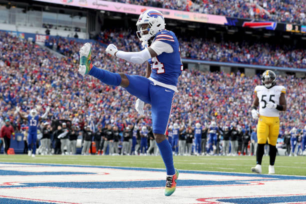 Stefon Diggs of the Buffalo Bills celebrates a touchdown catch against the Pittsburgh Steelers during the second quarter at Highmark Stadium on...