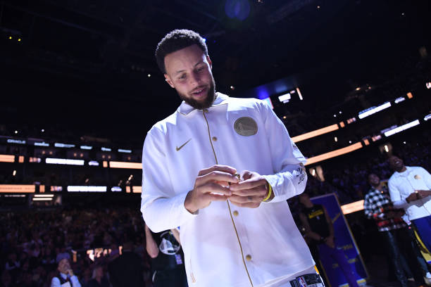 Stephen Curry of the Golden State Warriors checks out his ring on ring night prior to the game against the Los Angeles Lakers on October 18, 2022 at...