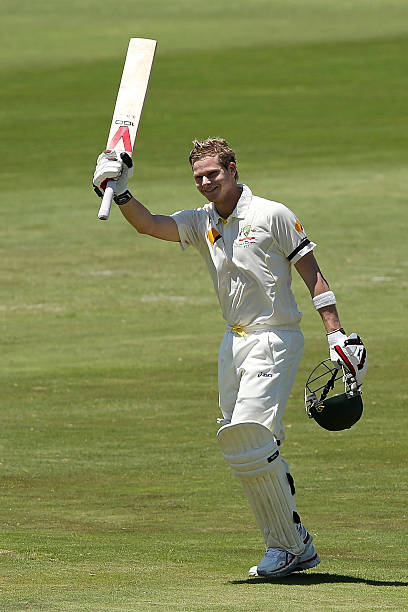 Steven Smith of Australia celebrates after reaching 100 runs during day two of the First Test match between South Africa and Australia on February...