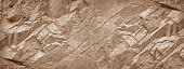 Stone wall background. Light brown rock texture. Stone grunge backdrop.