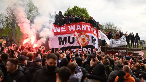 Supporters protest against Manchester United's owners, outside English Premier League club Manchester United's Old Trafford stadium in Manchester,...