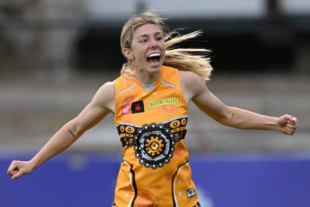 Tahlia Fellows of the Hawks celebrates a goal during the round five AFLW match between the Sydney Swans and the Hawthorn Hawks at Punt Road Oval on...