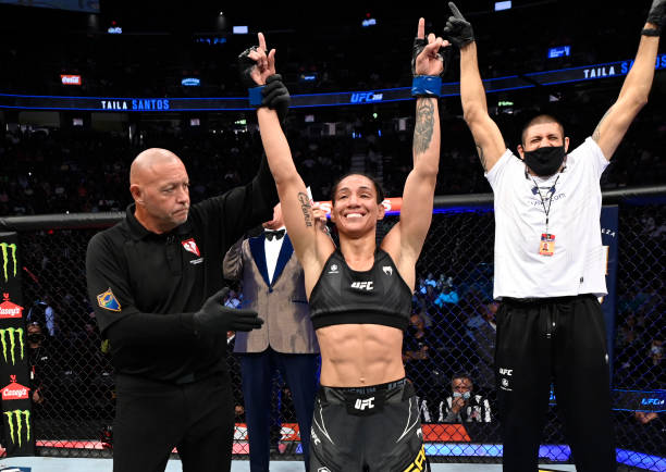 Taila Santos of Brazil reacts after her victory over Roxanne Modafferi in their flyweight fight during the UFC 266 event on September 25, 2021 in Las...