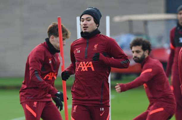 Takumi Minamino of Liverpool during a training session at AXA Training Centre on December 24, 2021 in Kirkby, England.
