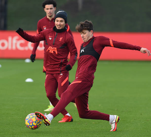Takumi Minamino of Liverpool moves in during a training session at AXA Training Centre on December 24, 2021 in Kirkby, England.