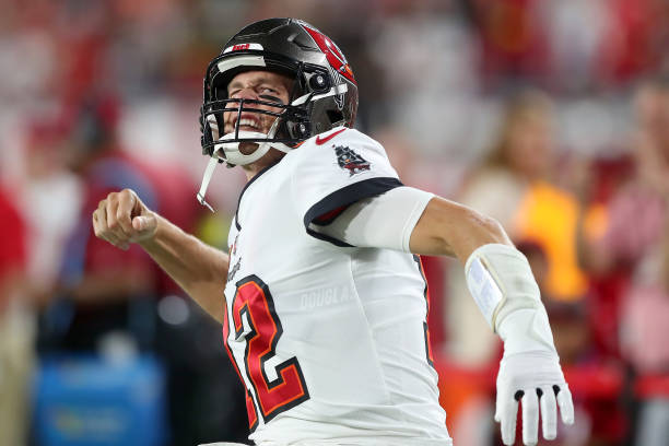 Tampa Bay Buccaneers Quarterback Tom Brady yells to the home crowd before the regular season game between the Kansas City Chiefs and the Tampa Bay...