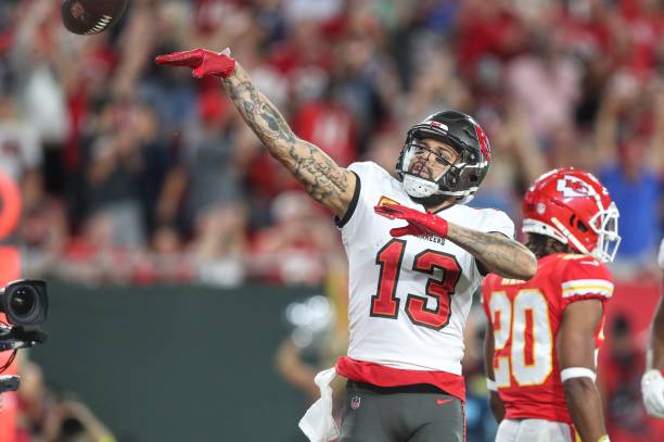 Tampa Bay Buccaneers Wide Receiver Mike Evans flips the ball into the stands during the regular season game between the Kansas City Chiefs and the...