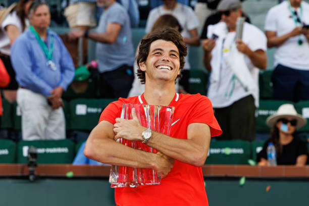 Taylor Fritz Of the United States celebrates winning the men's final of the BNP Paribas Open after beating Rafael Nadal on March 20, 2022 in Indian...