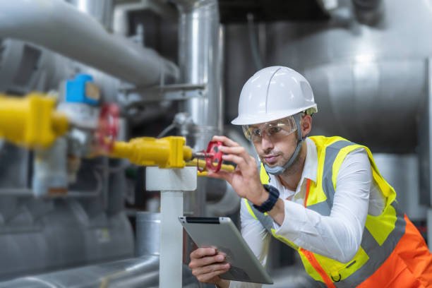 technician engineer working in industrial plant by checking valve picture