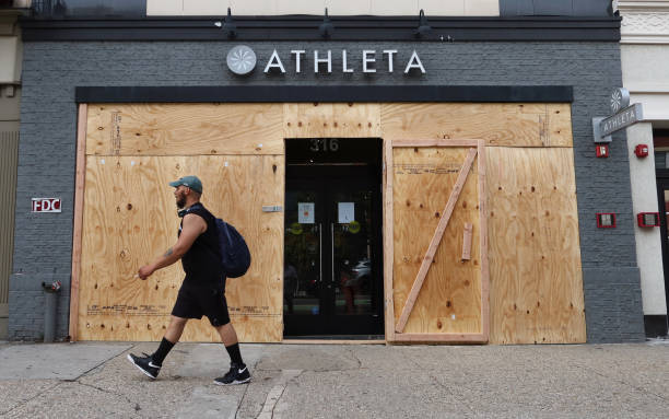 the athleta store boards up its windows ahead of a planned friday picture
