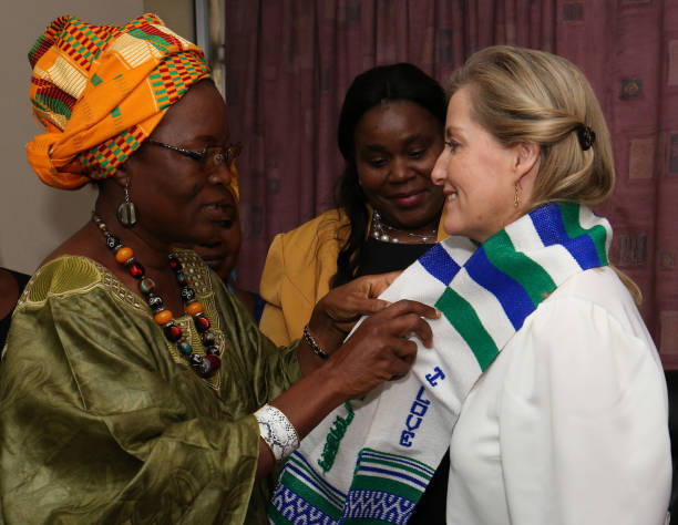 The Countess of Wessex receives a gift of an embroidered sash from members of a women's parliamentary group in Parliament Freetown on the first day...'s parliamentary group in Parliament Freetown on the first day...