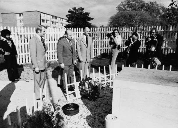 The crew of the Apollo-Soyuz Test Project , a joint US-Soviet space mission, lay a wreath at the grave of assassinated civil rights leader Dr Martin...