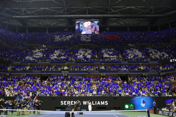The crowd acknowledges Serena Williams of the United States after her victory against Danka Kovinic of Montenegro during the Women's Singles First...