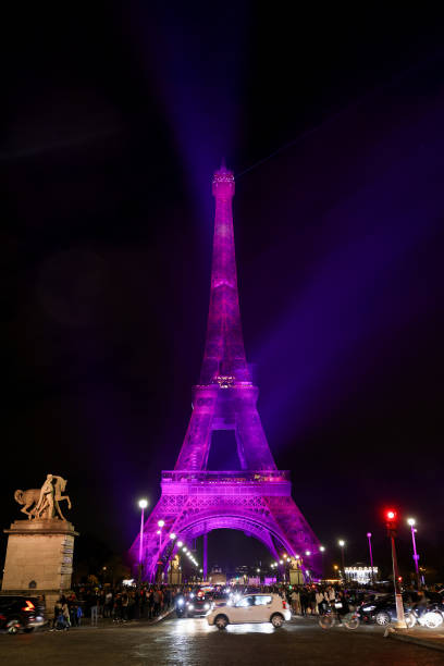 FRA: The Eiffel Tower Lights In Pink To Mark The Breast Cancer Awareness Month