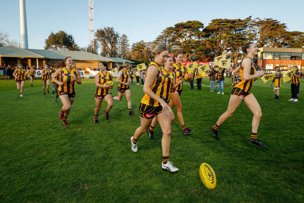 The Hawks enter the field during the 2022 S7 AFLW Round 06 match between the Hawthorn Hawks and the West Coast Eagles at Skybus Stadium on September...