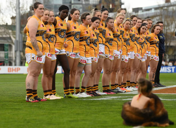 The Hawks stand for the Welcome to Country during the round three AFLW match between the Richmond Tigers and the Hawthorn Hawks at Punt Road Oval on...