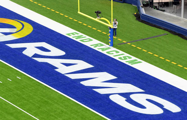 The message "End Racism" is seen in the end zone during the game between the Dallas Cowboys and the Los Angeles Rams at SoFi Stadium on September 13,...