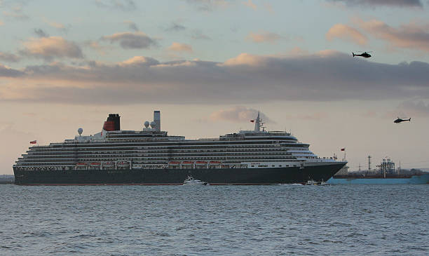 cunard - Quels sont vos paquebots préférés de la Cunard Line ? The-queen-victoria-cruise-liner-arrives-in-southampton-on-december-7-picture-id78298810?k=6&m=78298810&s=612x612&w=0&h=RIBrj_QZpE6_9Hu_2k0DO9kWssf6G3cvnRrkHpptO3k=