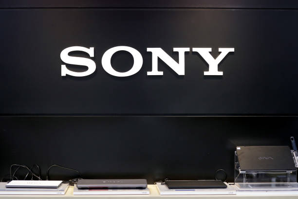 the sony corp logo is displayed on a wall as vaio laptop computers picture