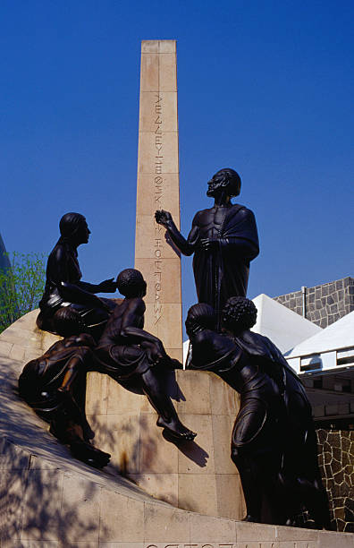 The statue (representing the learning and teaching of and for children) in front of the Papalote Museo del Nino
