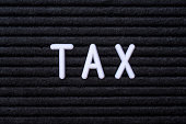 The word TAX