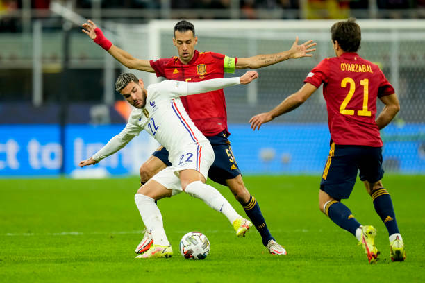 Theo Hernandez of France, Sergio Busquets of Spain and Mikel Oyarzabal of Spain battle for the ball during the UEFA Nations League Final match...