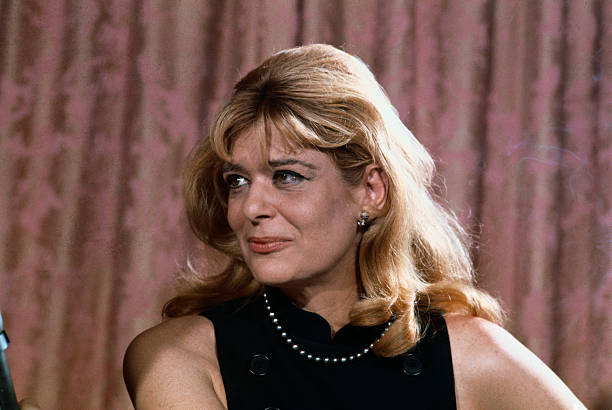 This is a close-up of actress, Melina Mercouri as she holds a press conference on July 12th, after being stripped of her Greek citizenship for...