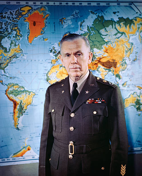 This photo shows Chief of Staff General George C Marshall at his headquarters in the War Department located in the Washington office