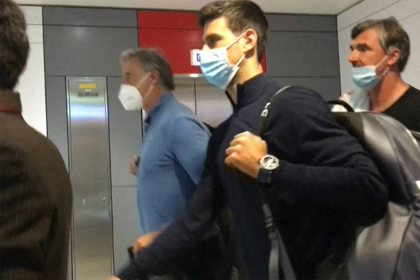This screen grab from AFPTV shows Serbia's Novak Djokovic as he disembarks from his plane at the airport in Dubai on January 17 after losing a legal...