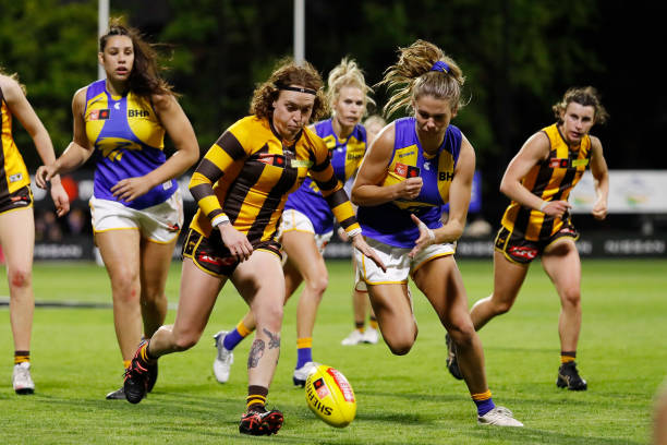 Tilly Lucas-Rodd of the Hawks and Ella Roberts of the Eagles compete for the ball during the 2022 S7 AFLW Round 06 match between the Hawthorn Hawks...