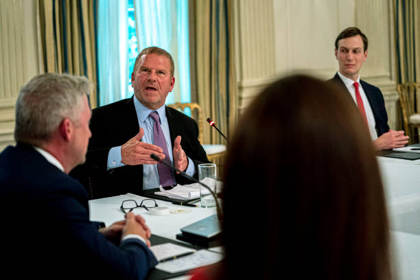 Tilman Fertitta, owner of the Houston Rockets, makes remarks towards President Donald Trump during a roundtable in the State Dining Room of the White...