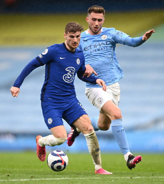 Timo Werner of Chelsea is challenged by Aymeric Laporte of Manchester City during the Premier League match between Manchester City and Chelsea at...