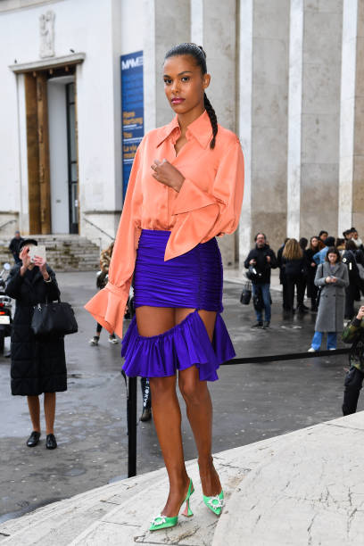 Tina Kunakey is seen wearing rust brown faux fur coat outside Stella McCartney during Paris Fashion Week Womenswear Fall/Winter 2020/2021 Day Eight...