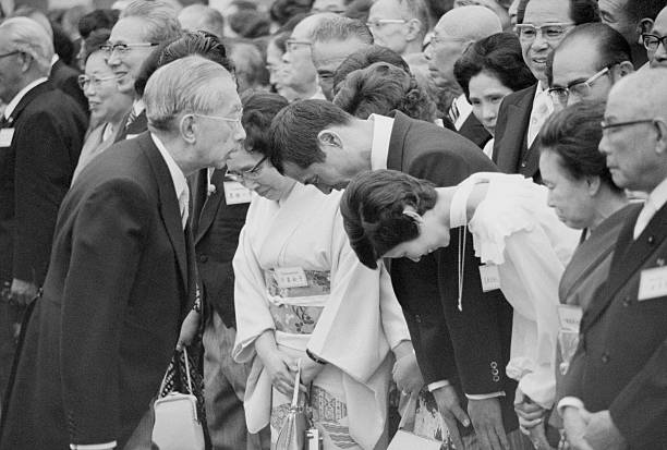 Tokyo: Japanese home run king Sadaharu Oh and his wife, Kyoko, bow to Emperor Hirohito, , before they talk to him at the annual autumn garden party...