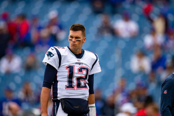 Tom Brady of the New England Patriots warms up before the game against the Buffalo Bills at New Era Field on September 29, 2019 in Orchard Park, New...