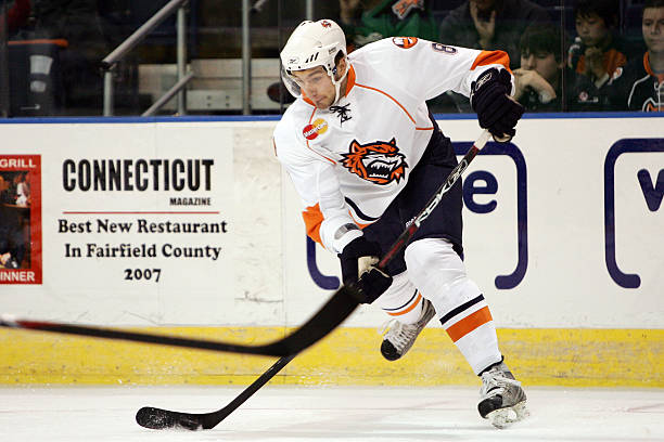 Tomas Marcinko of the Bridgeport Sound Tigers takes a shot on goal during the first period against the Philadelphia Phantoms on October 19, 2008 at...